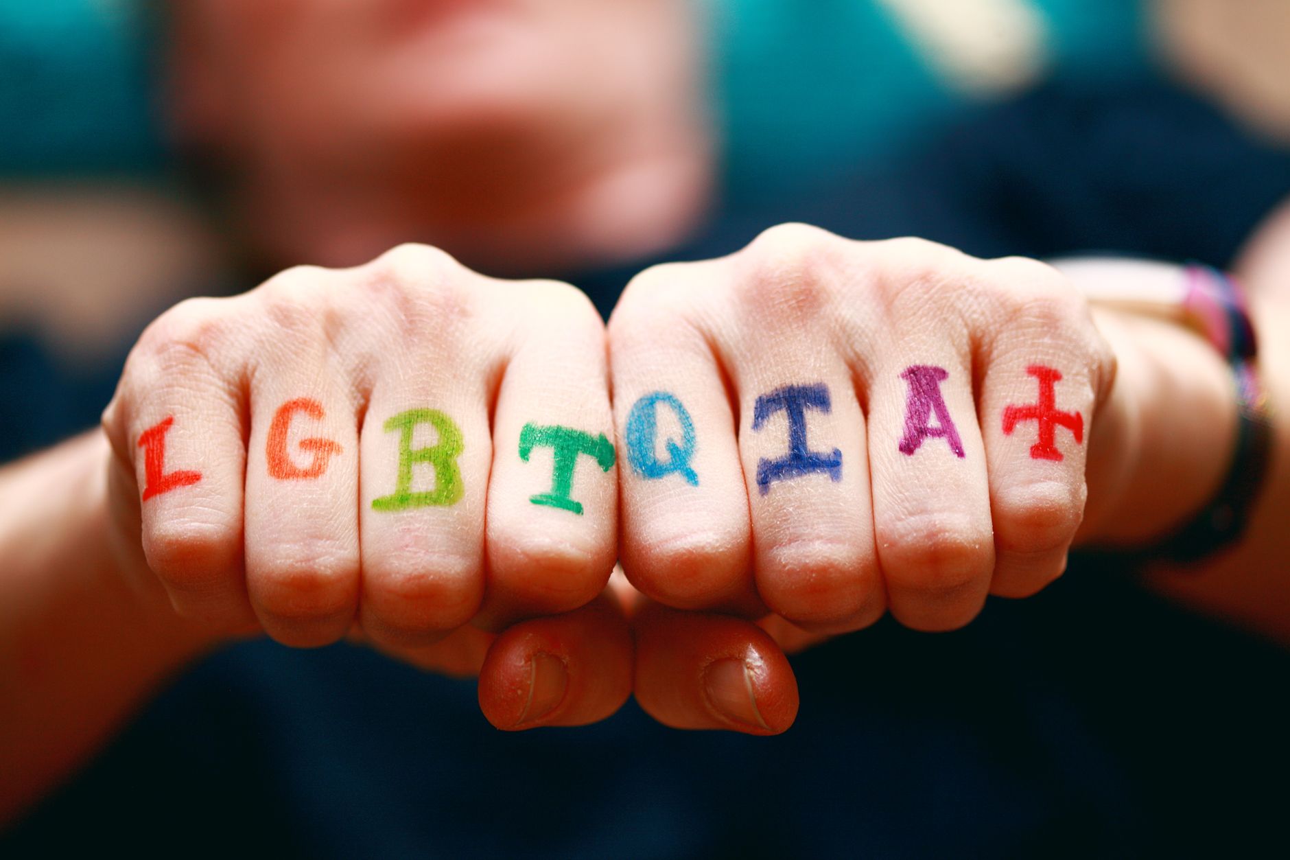 close up shot of person with tattoos on his hand